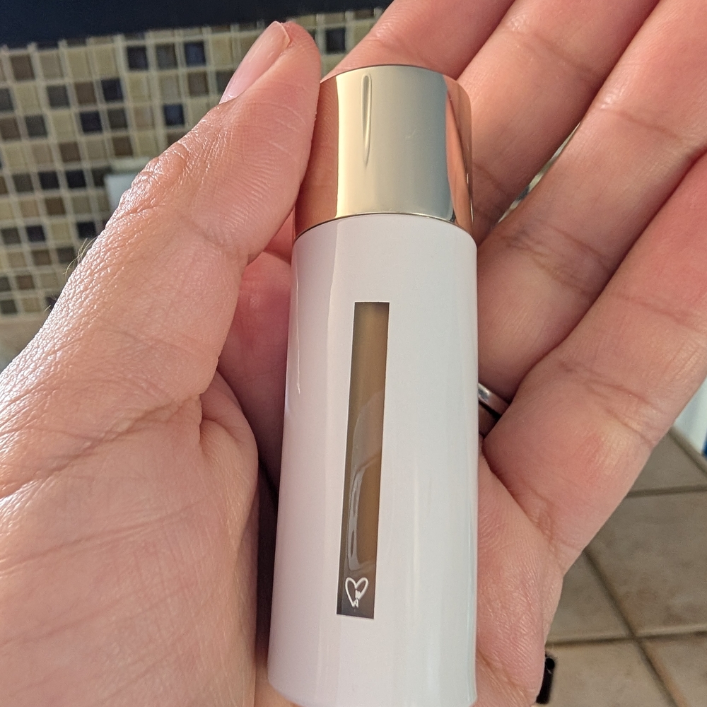 Elegant White and Gold Makeup Bottle